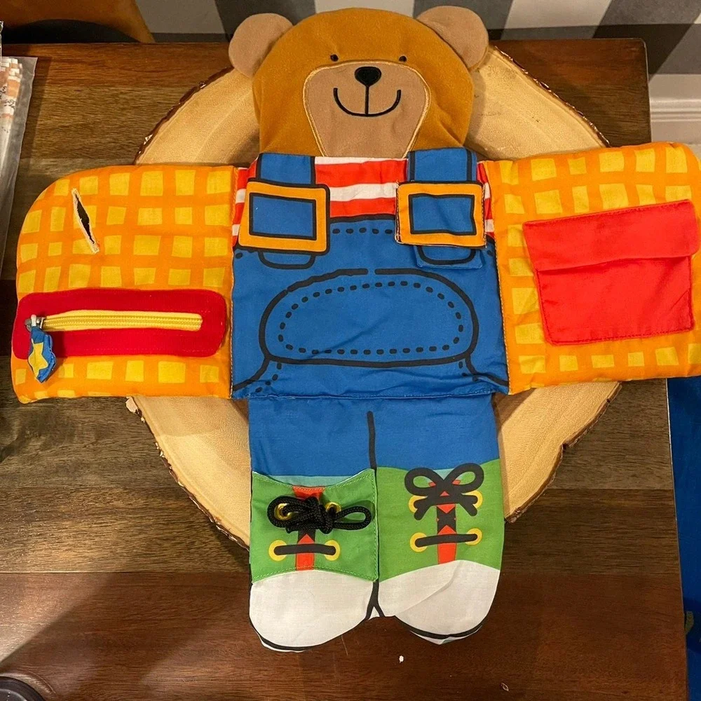 Melissa & Doug Dress-Up Bear Cloth Activity Book Toddler Quiet Book
